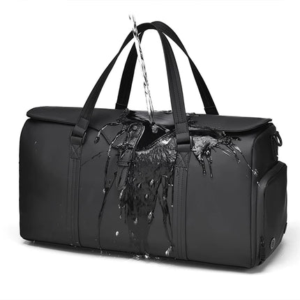 caveri marlowe Black duffel bag with water splashes on a white background. waterproof bag