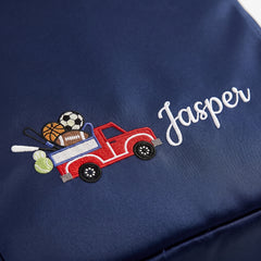 Caveri personalised packing cube in Ink Blue with embroidered pickup truck icon