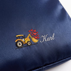 Caveri personalised packing cube in Ink Blue with embroidered tractor icon