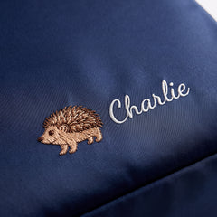 Caveri personalised packing cube in Ink Blue with embroidered hedgehog icon