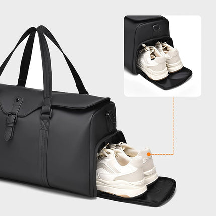caveri marlowe Black duffel bag with shoe compartment featuring white sneakers on a light gray background