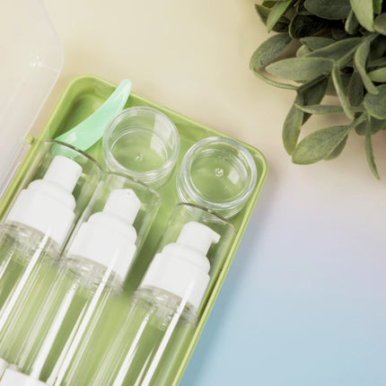 Caveri 6-piece travel bottle set in green case with pump bottles and cream jars