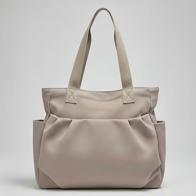 Caveri day tote bag in warm taupe with structured base and side pockets, front view