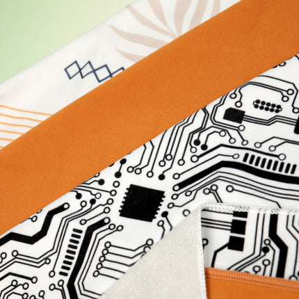 Caveri grip wrap in circuit board print with burnt orange binding, showing soft grey reverse lining