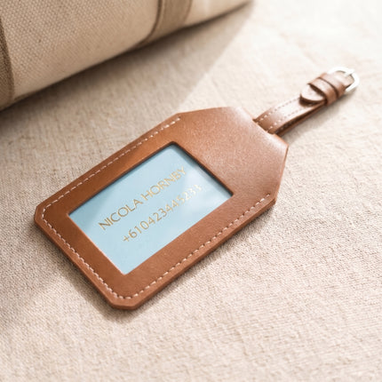 Caveri luggage tag with personalised ID card in baby blue