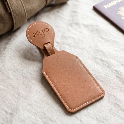 Caveri vegan leather luggage tag in Brown