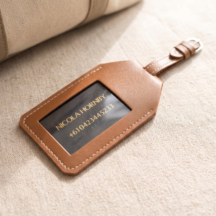 Caveri luggage tag in Brown with foil-stamped ID card