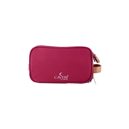Caveri toiletry bag in fuchsia with tan leather wrist strap and dual zip, front view