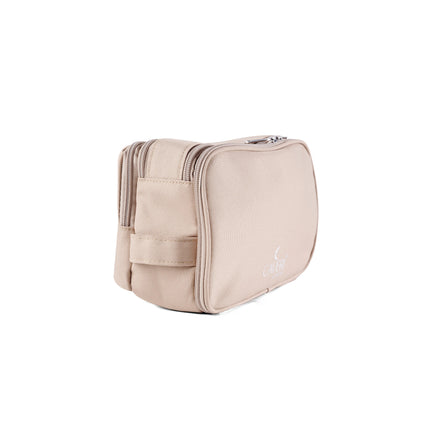 Caveri toiletry bag in sand beige with double zip and carry handle, side angle view