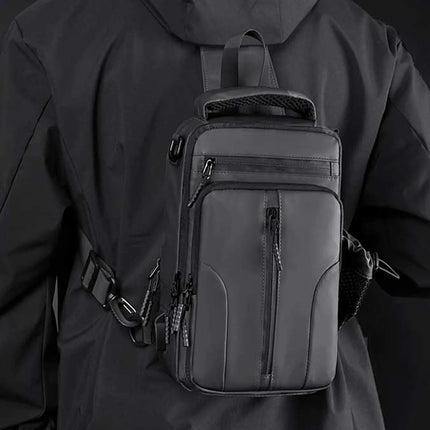 Caveri Tony crossbody sling bag in charcoal grey worn on back, showing multi-pocket front and side mesh panel