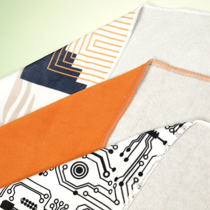 Caveri travel grip wraps in geometric and circuit board prints showing soft suede reverse side