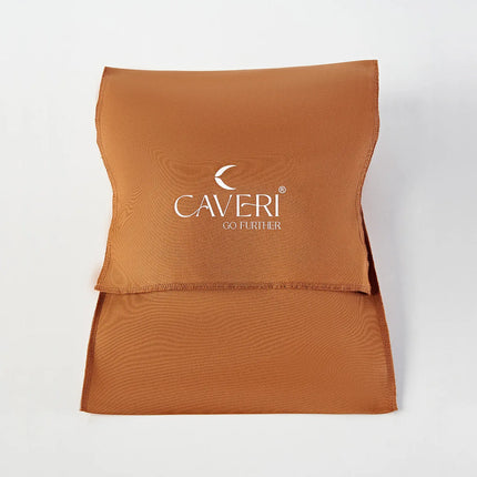 Caveri travel packing pouch in terracotta, shown flat with folded flap closure