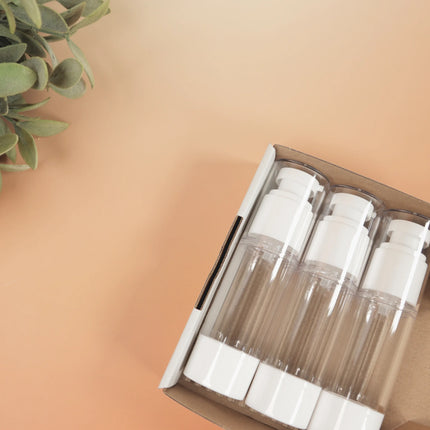Caveri 3-pack 30ml clear travel pump bottles with white caps in open cardboard box