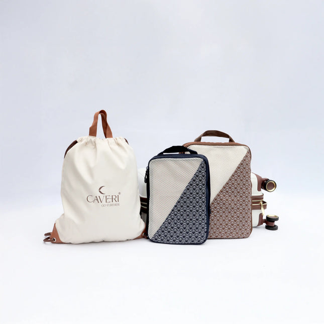 Caveri weekend travel set with drawstring bag, packing cube and hardcase luggage in cream and tan