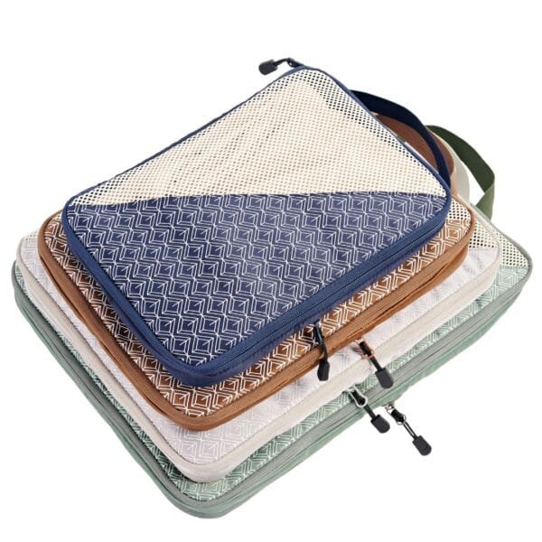 Multi-sized Caveri compression bags for hiking, beach trips, and camping – wrinkle-free fabric, YKK zippers, and anti-bulge design.